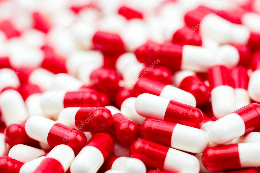 Selective focus of antibiotic capsules pills on blur background with copy space. Drug resistance concept. Antibiotics drug use with reasonable and global healthcare concept.