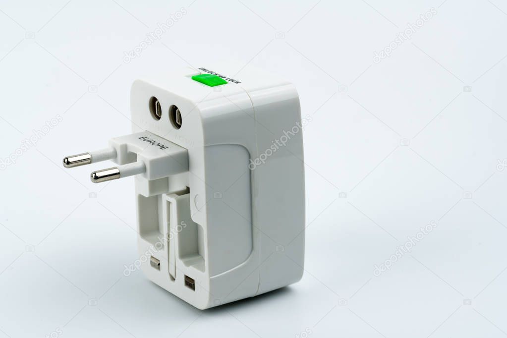 Universal plug adapters for travel around the world isolated on white background.