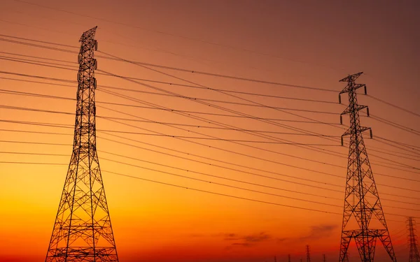 Högspänning Elektrisk Pylon Och Elektrisk Tråd Med Solnedgång Himmel Elstolpar — Stockfoto