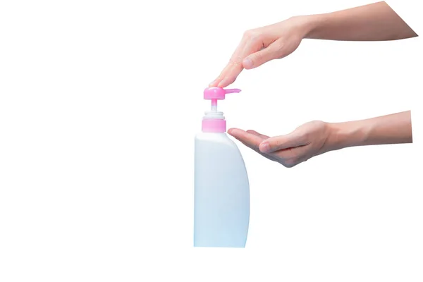 女人的手按在泵上 把化妆品瓶隔离在白色上 洗发水或护发素塑料瓶和配药泵 肥皂或淋浴液包装 液体肥皂瓶 身体乳液瓶 — 图库照片