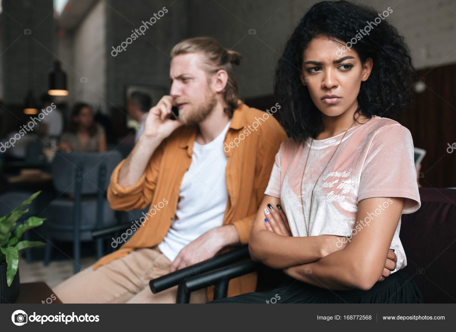 Upset African American Girl With Dark Curly Hair Sadly