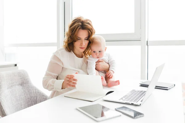 Portrait Thoughtful Business Woman Holding Her Cute Little Baby While — Stock Photo, Image