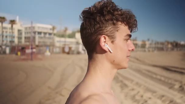 Side View Shot Young Sporty Man Wireless Earphones Resting Workout — Stock Video