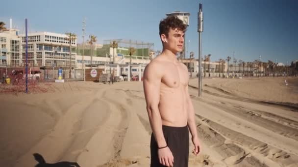 Tracking Shot Attractive Fit Guy Confidently Looking Camera Workout Beach — Video