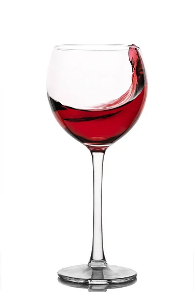 Moving red wine glass over a white background — Stock Photo, Image