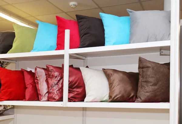 Pillows on shelf — Stock Photo, Image