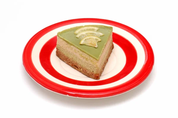 Raw cake on plate — Stock Photo, Image