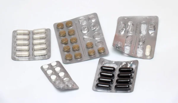 Tablets and pills in blisters — Stock Photo, Image