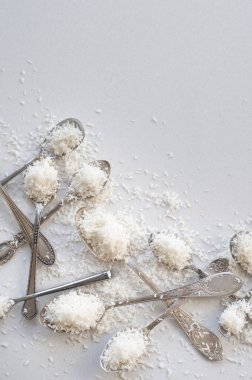 Spoons with Desiccated Coconut clipart