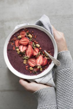 Acai kase holding eller 