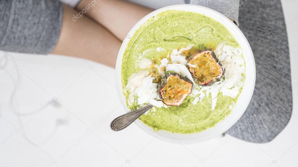 woman holding Smoothie Bowl