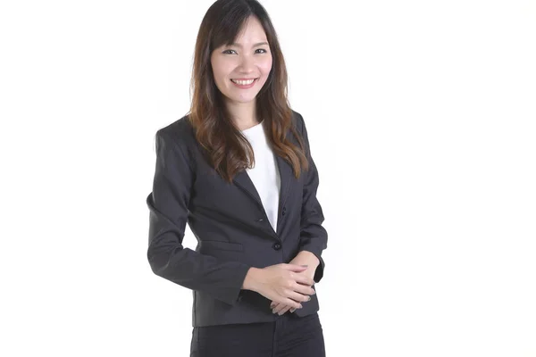 Perempuan bisnis yang sukses dalam pakaian bisnis tersenyum di latar belakang putih . — Stok Foto