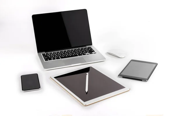 Office table with laptop computer, digital tablet, smartphone, p — Stock Photo, Image