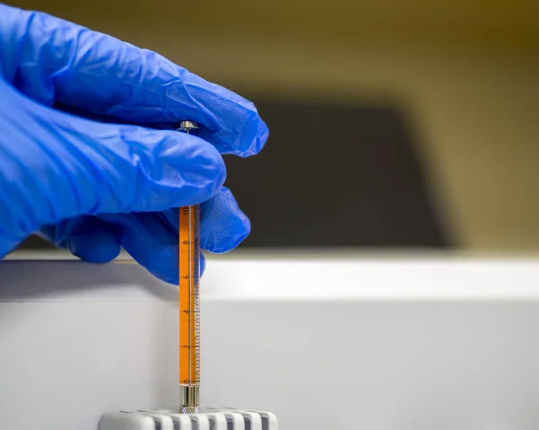 Injecting Sample Using Syringe Gas Chromatography Instrument — 스톡 사진