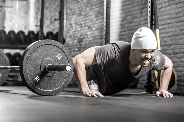 Pushup workout in gym — Stok fotoğraf