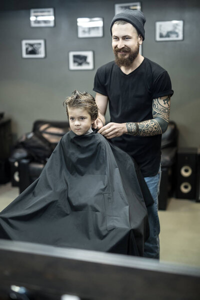 Little kid in barbershop
