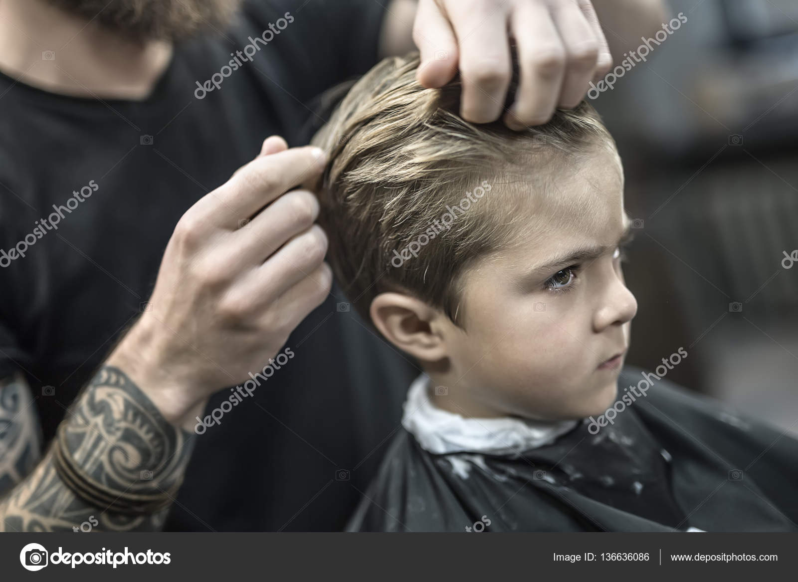 Kids hair styling in barbershop Stock Photo by ©bezikus 136636086