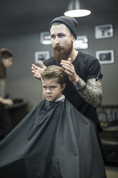 Kids hair styling in barbershop