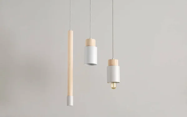 Hanging lamps with wooden parts — Stock Photo, Image