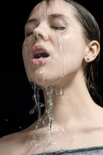 Water splashes on womans face — Stock Photo, Image