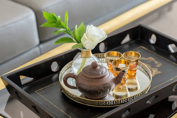 Wooden tray with teapot and glasses — Stock Photo, Image