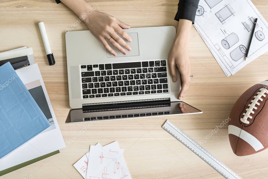 Woman using laptop in office