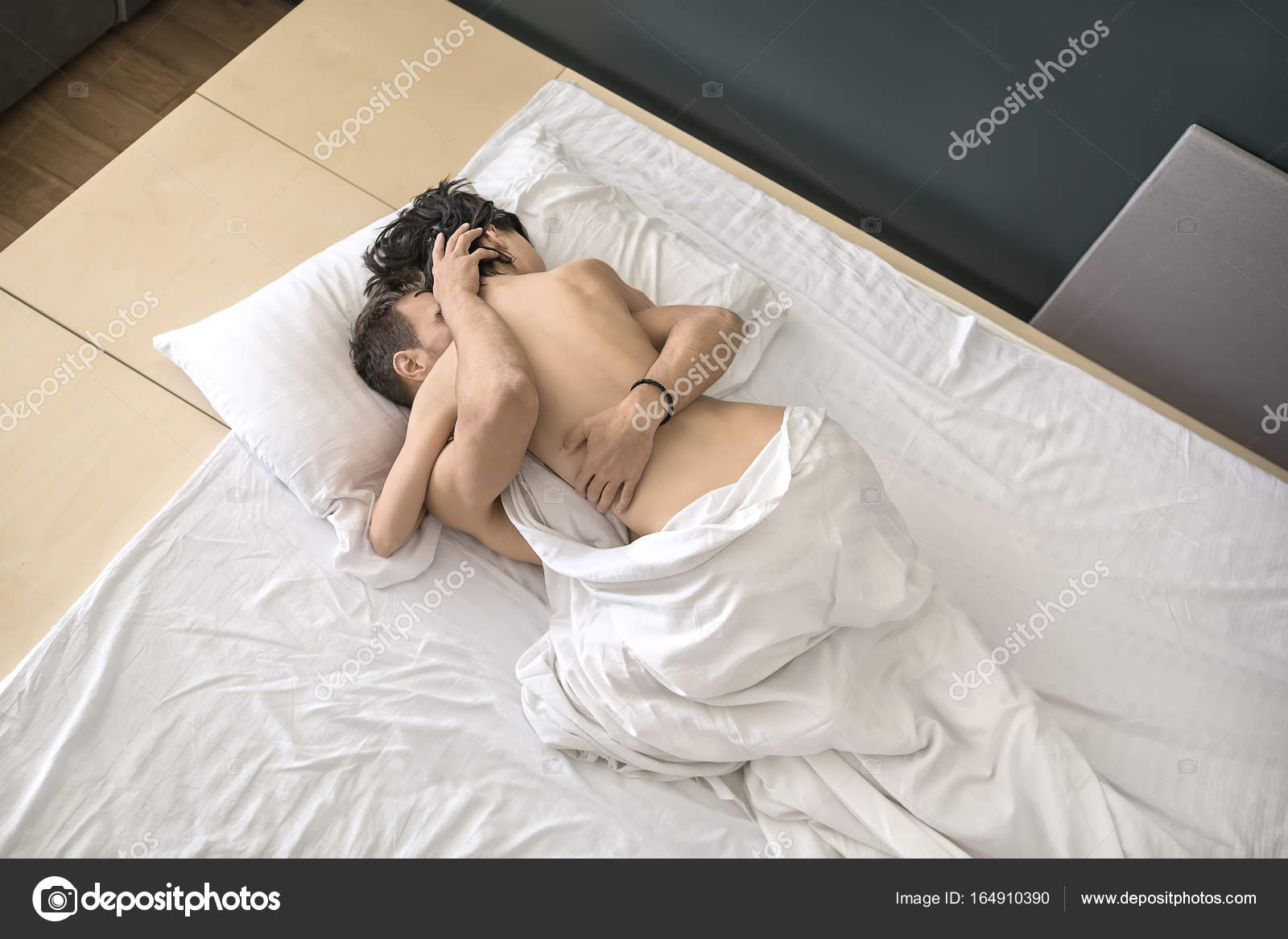 Sexy couple on bed Stock Photo by ©bezikus 164910390 image