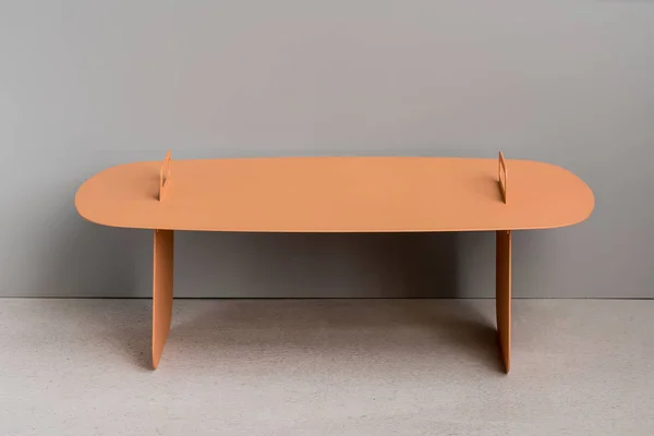 Steel orange table — Stock Photo, Image