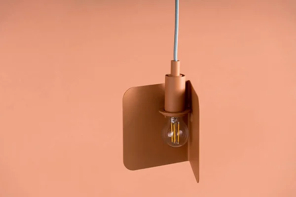 Hanging metal orange edison lamp — Stock Photo, Image