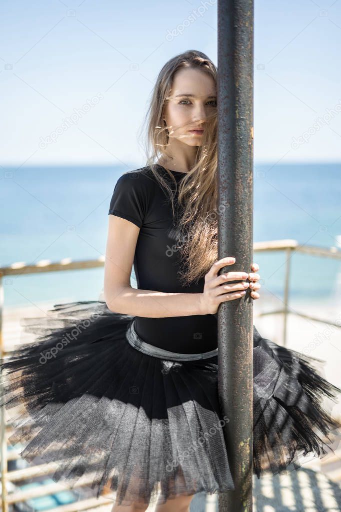 Ballerina posing outdoors