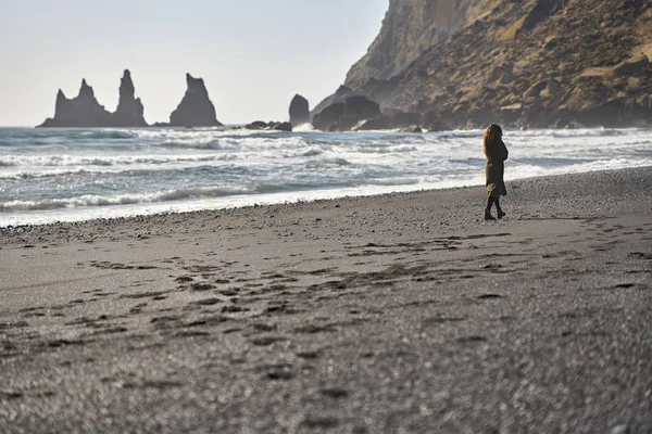 Girl walking on beach