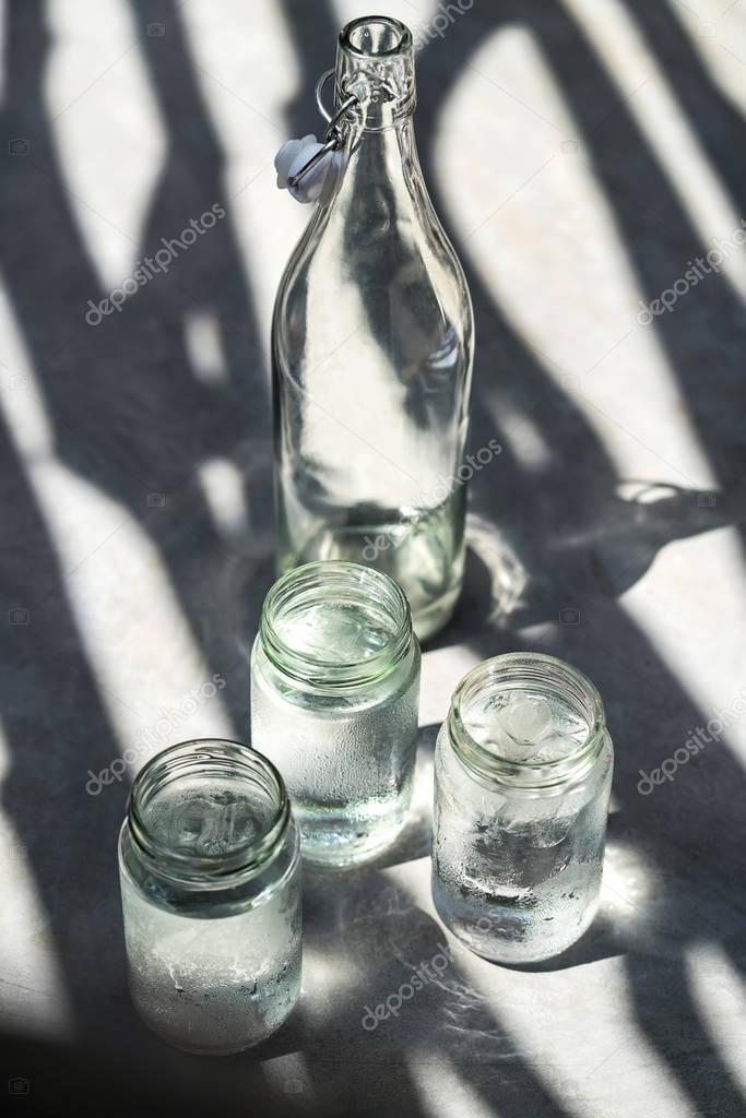 Bottle with glass jars