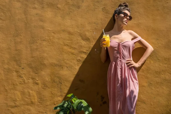 Girl with cocktail outdoors — Stock Photo, Image