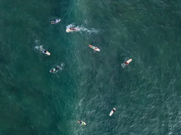 Aerial photo of surfers on boards — Stock Photo, Image