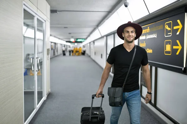 Young guy in airport — Stock Photo, Image