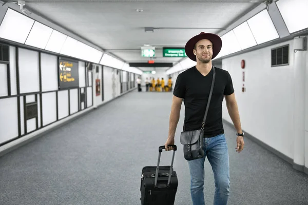 Young guy in airport — Stock Photo, Image