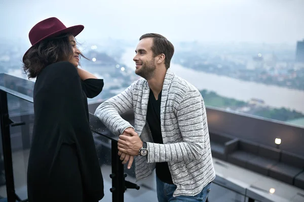 Beautiful interracial couple on balcony — Stock Photo, Image