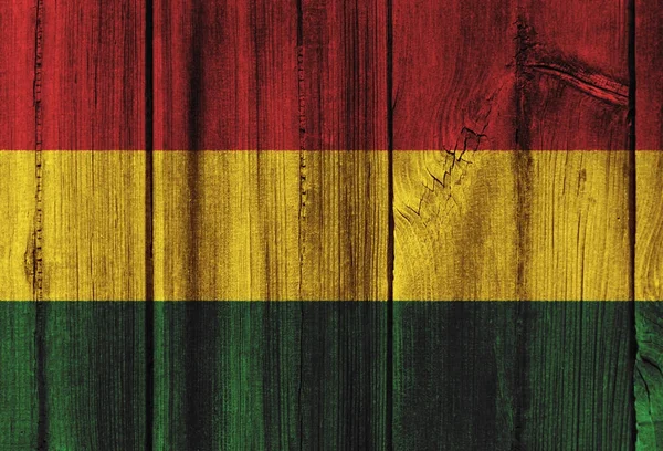 Arkaplan için tahta duvara Bolivya bayrağı boyanmış — Stok fotoğraf