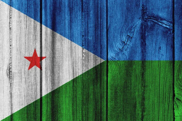 Vlag van Djibouti geschilderd op houten muur voor achtergrond — Stockfoto