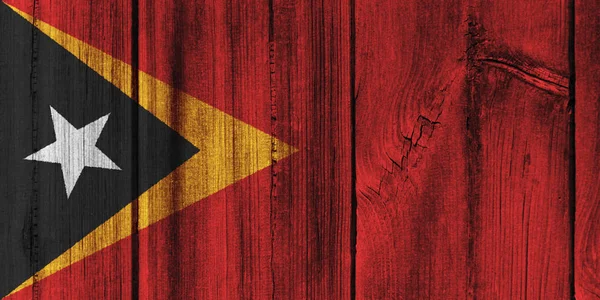 Bandeira de Timor-Leste pintada na parede de madeira para fundo — Fotografia de Stock