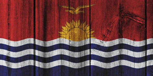 背景の木の壁に描かれたキリバス共和国の旗 — ストック写真