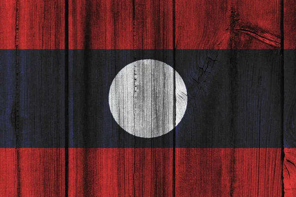 Laos vlag geschilderd op houten muur voor achtergrond — Stockfoto