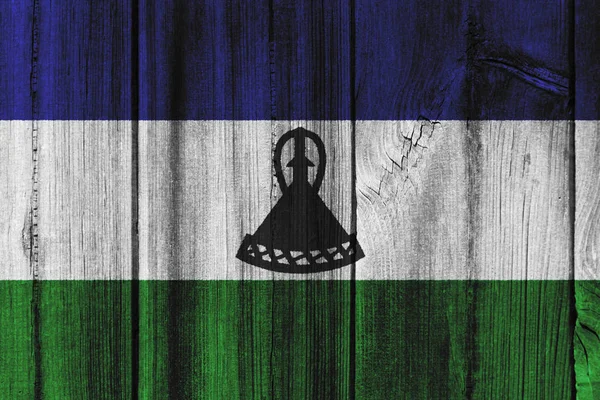 Bandera Lesotho pintada sobre pared de madera para fondo —  Fotos de Stock