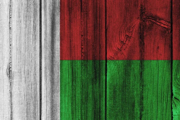 Arka plan için ahşap duvar boyalı Madagaskar bayrağı — Stok fotoğraf