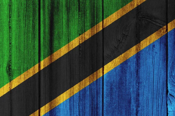 Tanzania vlag geschilderd op houten muur voor achtergrond — Stockfoto
