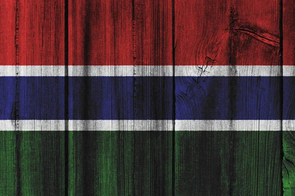 Bandeira da Gâmbia pintada na parede de madeira para fundo — Fotografia de Stock