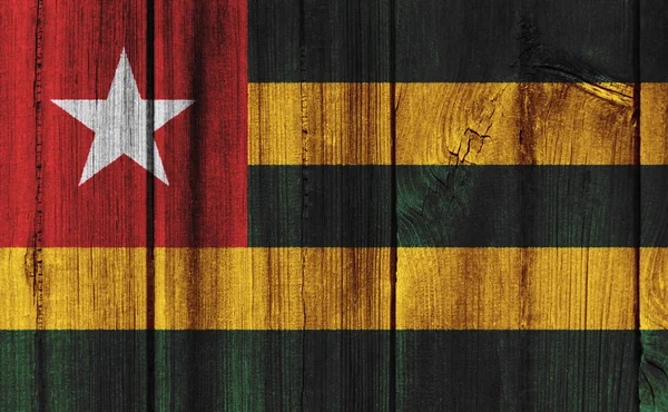 Flaga Togo malowane na drewnianych ścian na tle — Zdjęcie stockowe