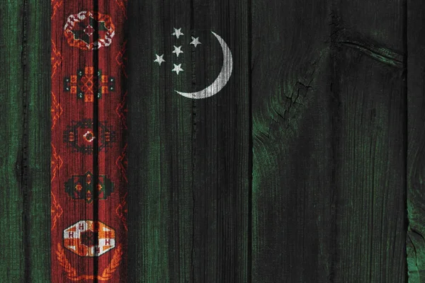 Bandeira do Turquemenistão pintada na parede de madeira para fundo — Fotografia de Stock