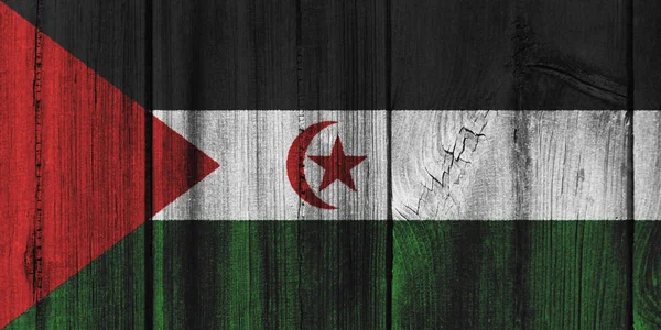 Westelijke Sahara vlag geschilderd op houten muur voor achtergrond — Stockfoto