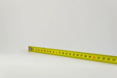 Ölçü birimi teyp, santimetre sarı. Ölçü aracı donanımları. Backgr
